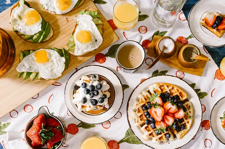 Round white ceramic plate filled with waffle.