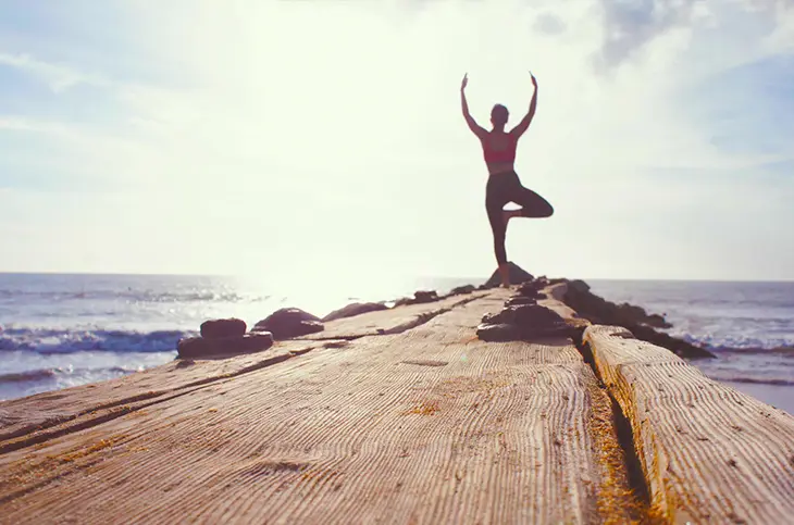 Woman doing yoga.