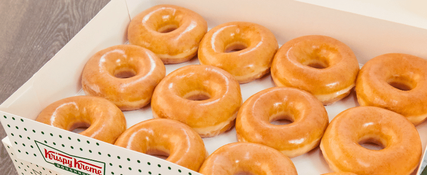 A box of Krispy Kreme donuts, representing Krispy Kreme's birthday reward.